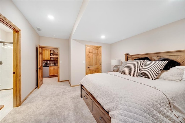 bedroom with light colored carpet