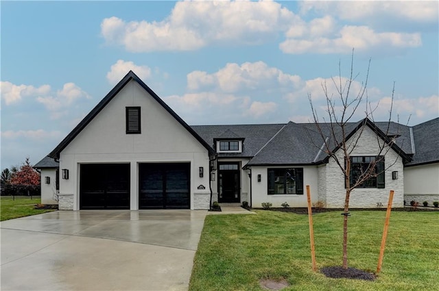 modern farmhouse featuring a front yard and a garage