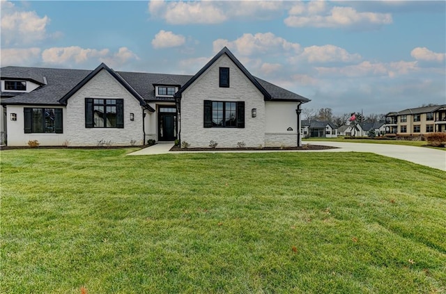 french country home with a front yard