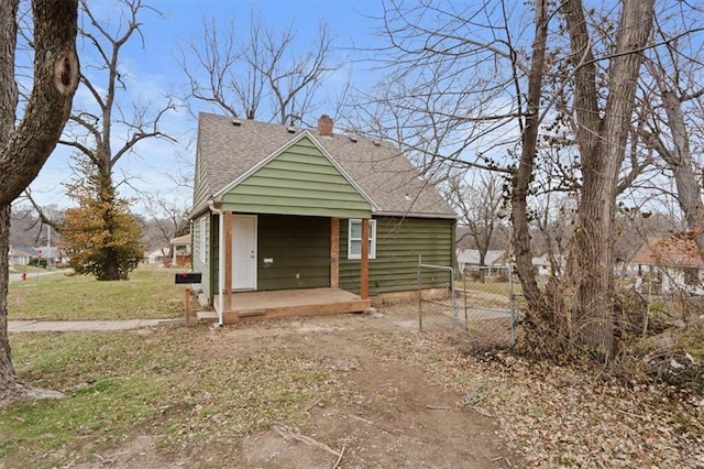 exterior space with a front yard