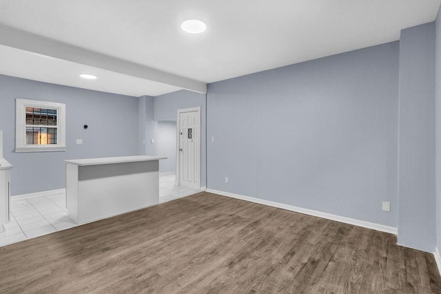 empty room featuring light tile patterned floors