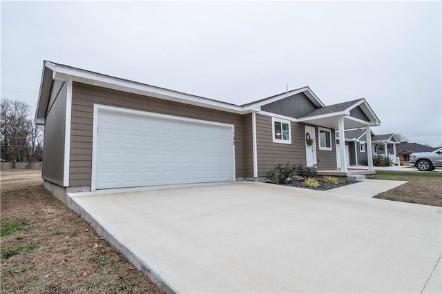 ranch-style house featuring a garage