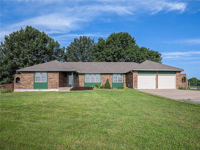 ranch-style house with a front yard and a garage