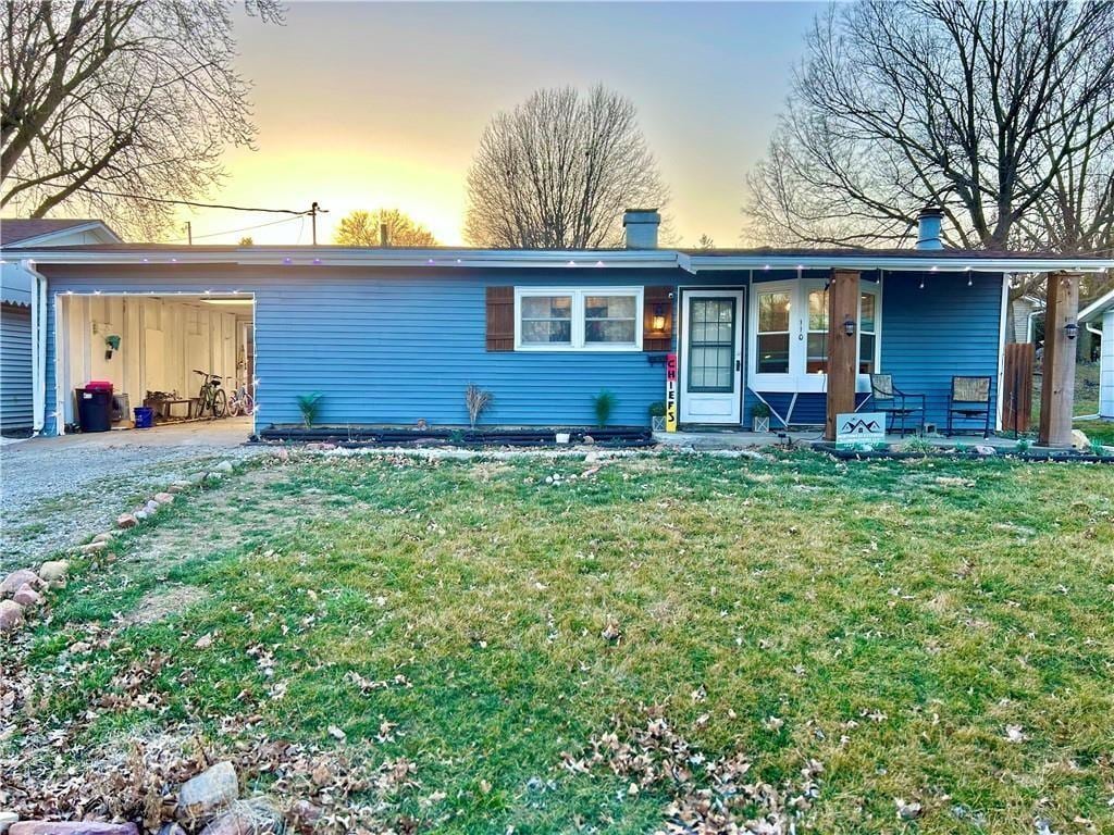 view of front of house with a lawn