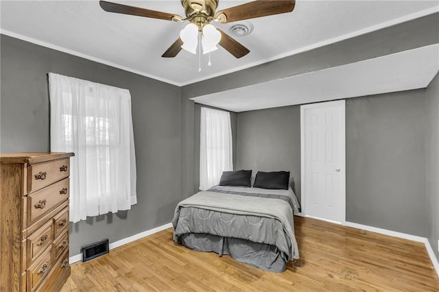 bedroom featuring ceiling fan and light wood-type flooring