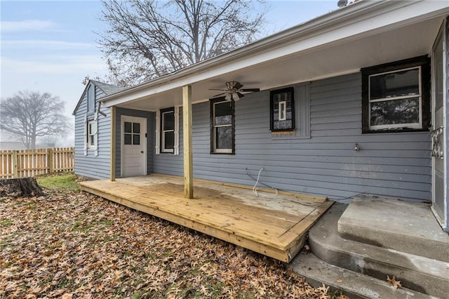 exterior space with ceiling fan