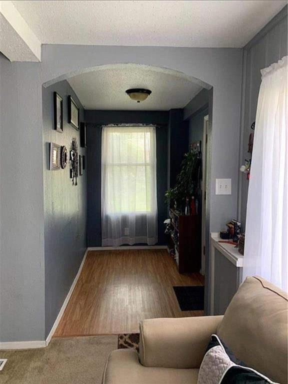 entryway with a textured ceiling