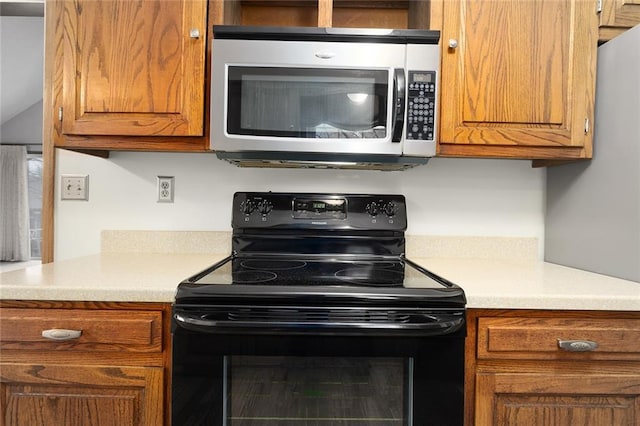 kitchen featuring black electric range oven