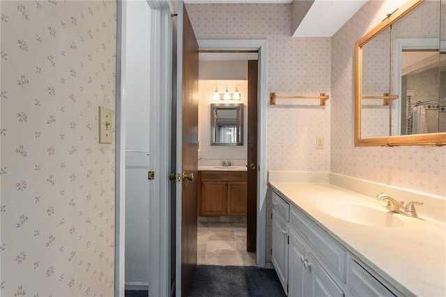 bathroom with vanity and curtained shower