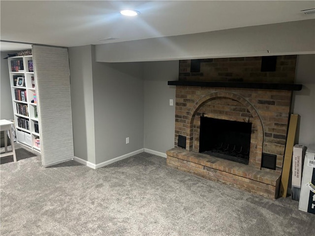 unfurnished living room with a fireplace and carpet floors