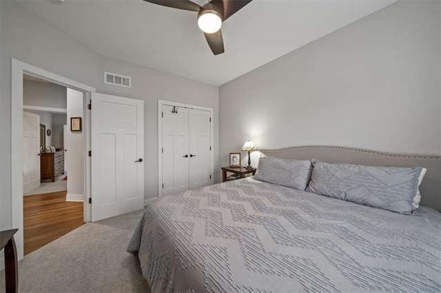 bedroom featuring carpet flooring, ceiling fan, and a closet