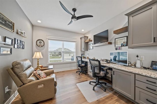 office area featuring ceiling fan and light wood-type flooring