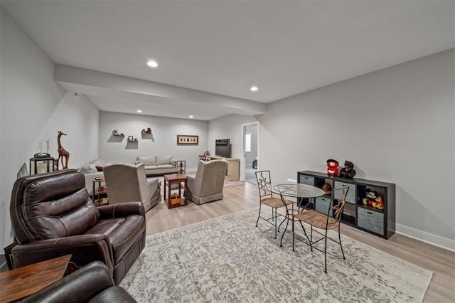 living room with light hardwood / wood-style flooring