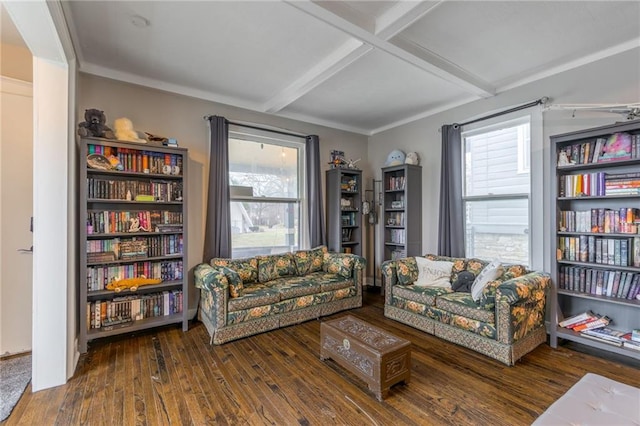 living area featuring coffered ceiling, a wealth of natural light, beamed ceiling, and dark hardwood / wood-style floors