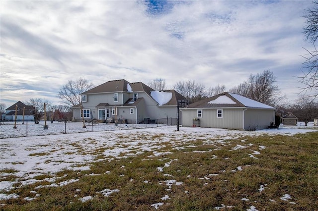 view of snow covered house