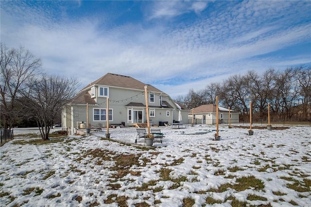 view of snow covered house