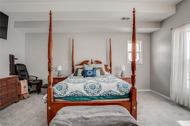 bedroom featuring light colored carpet