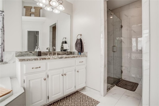 bathroom featuring vanity and walk in shower