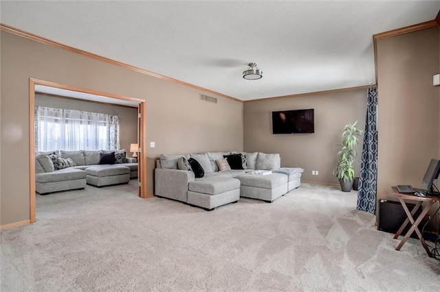 carpeted living room featuring ornamental molding