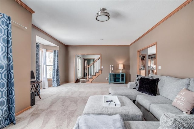 carpeted living room with crown molding