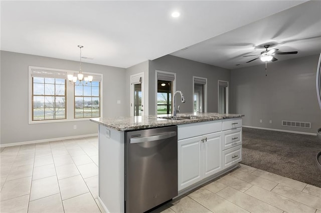 kitchen with a sink, white cabinetry, hanging light fixtures, dishwasher, and an island with sink