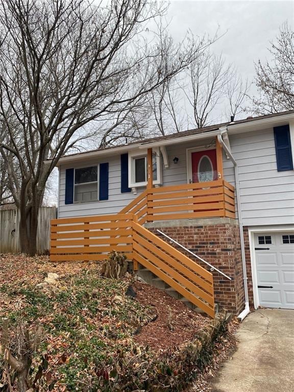 view of front of property featuring a garage