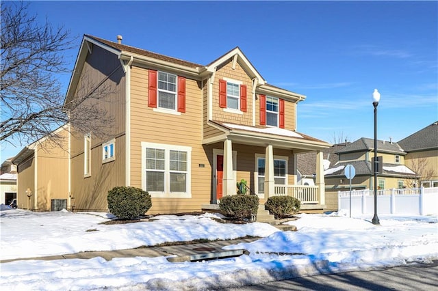 view of property featuring covered porch