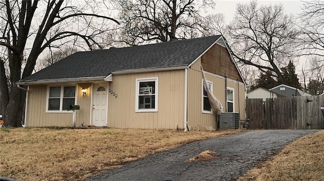 view of front of house featuring cooling unit