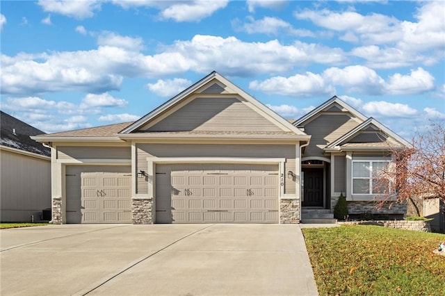 craftsman-style home with a garage