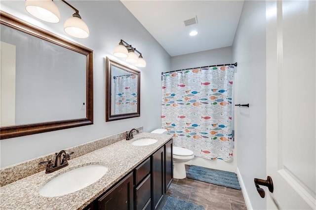 full bathroom with vanity, toilet, and shower / bathtub combination with curtain