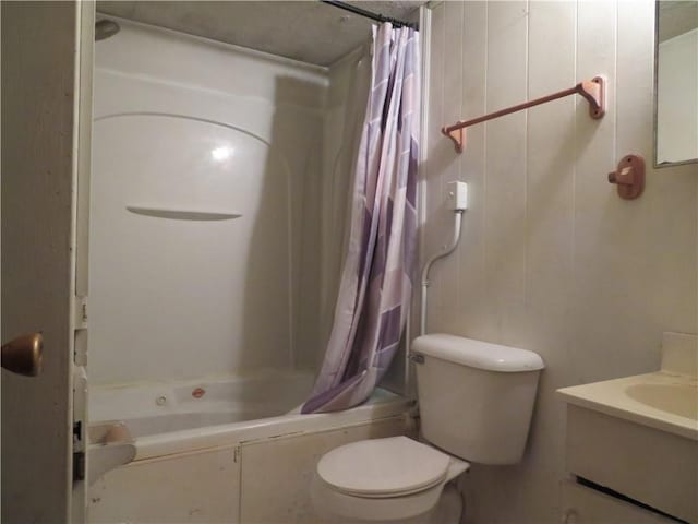 full bathroom with vanity, toilet, and shower / bath combo with shower curtain