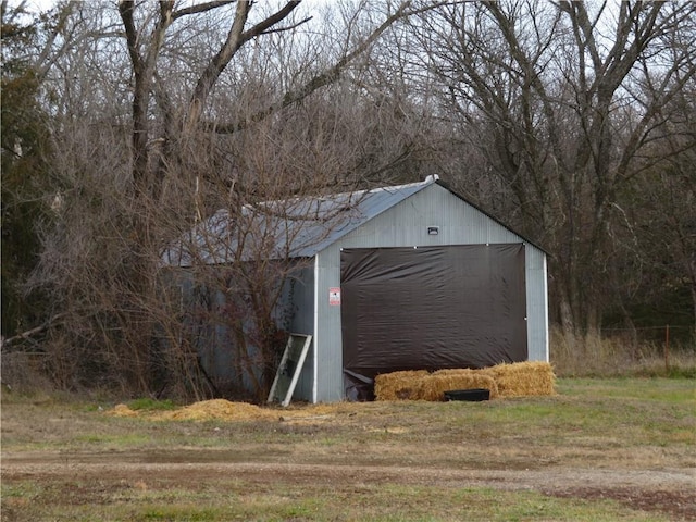 view of outbuilding featuring a garage