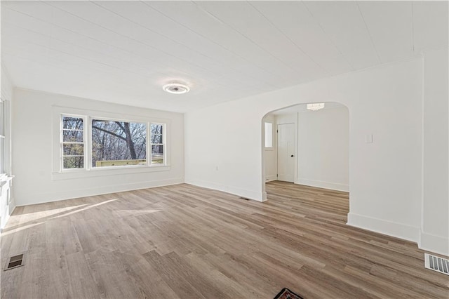 unfurnished living room featuring wood-type flooring