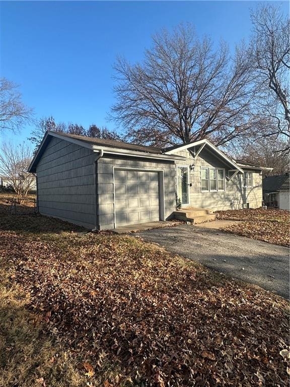 exterior space with a garage