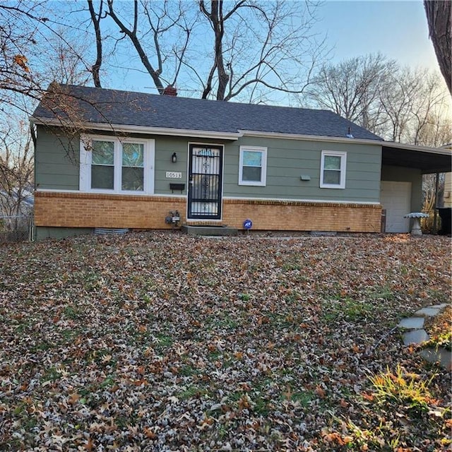 ranch-style house with a carport