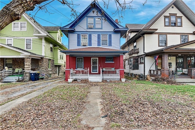 victorian-style house with a porch