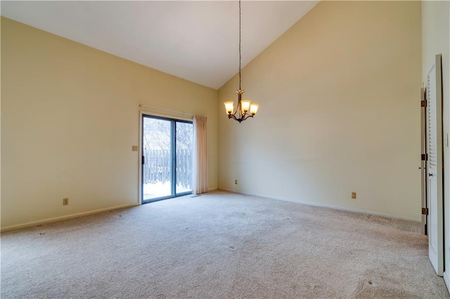 unfurnished room with a chandelier, light carpet, and high vaulted ceiling