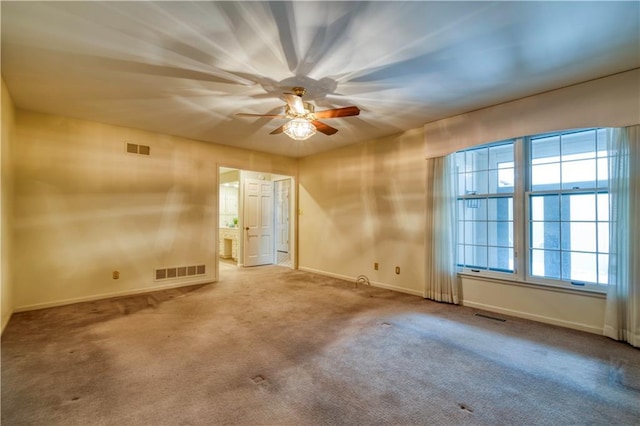 unfurnished room featuring carpet flooring and ceiling fan