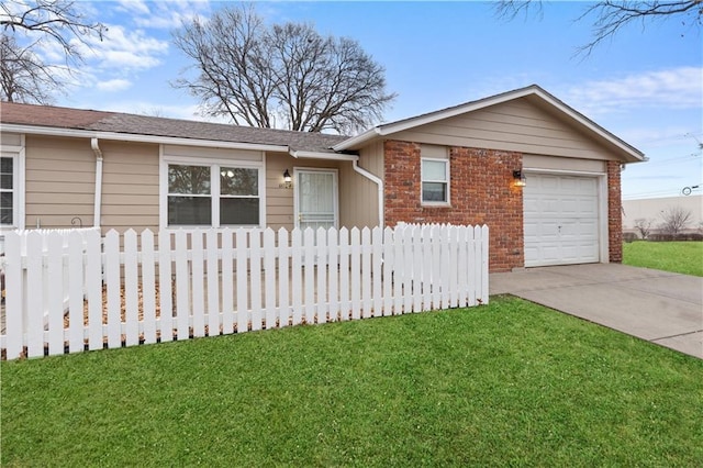 single story home with a garage and a front lawn