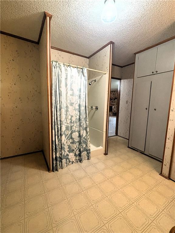 bathroom with a textured ceiling