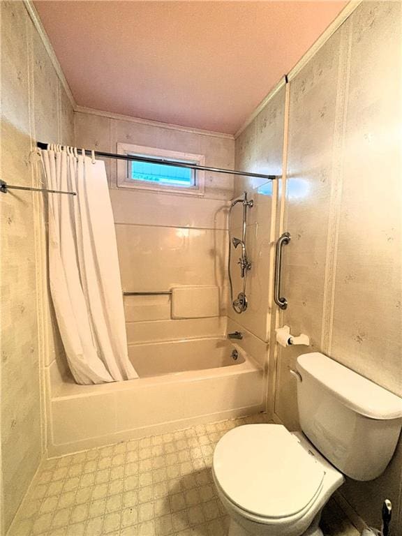 bathroom with toilet and shower / tub combo with curtain