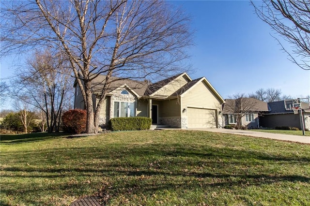 view of front of house with a front yard and a garage