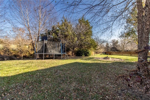 view of yard featuring a trampoline