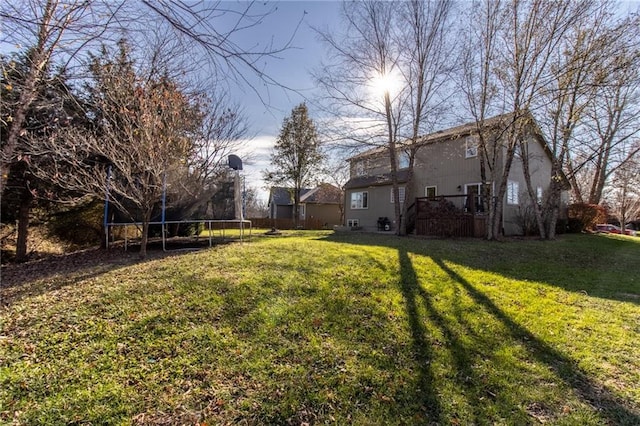 view of yard with a trampoline