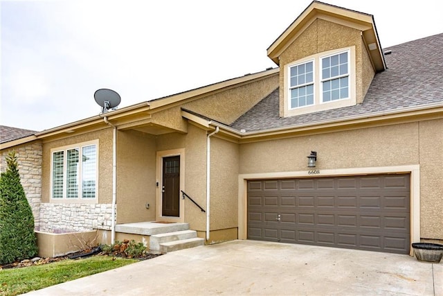 view of front of property with a garage