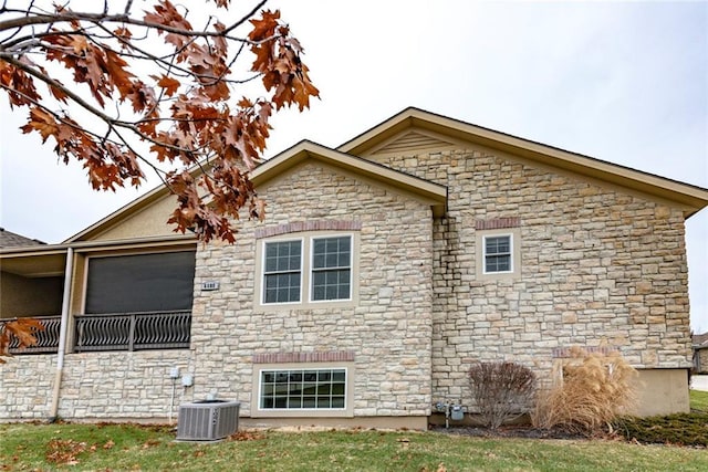 view of side of property featuring cooling unit