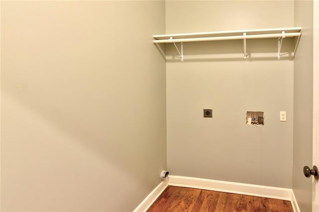 laundry room with electric dryer hookup, washer hookup, and wood-type flooring