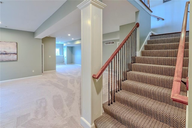 stairway with carpet floors