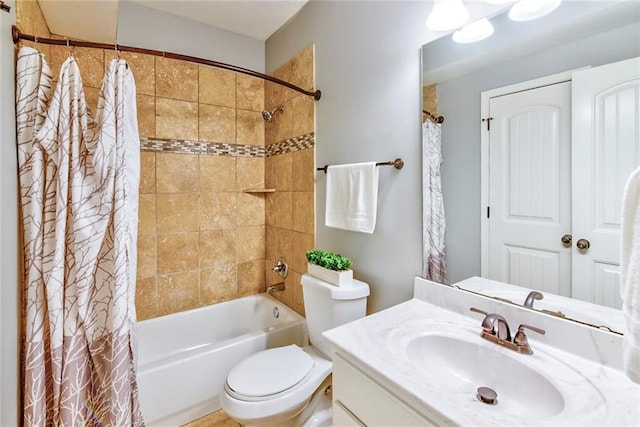 full bathroom featuring shower / bath combo with shower curtain, vanity, and toilet