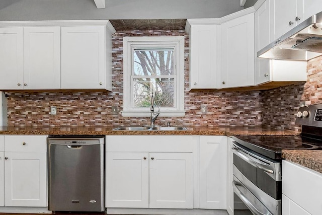 kitchen with white cabinets, decorative backsplash, sink, and appliances with stainless steel finishes